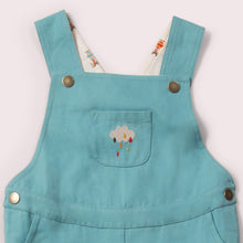 Lade das Bild in den Galerie-Viewer, Little-Green-Radicals-Blue-Shortie-Dungarees-With-Cloud-Print-Closeup
