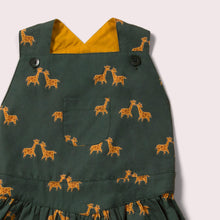 Lade das Bild in den Galerie-Viewer,     Little-Green-Radicals-Green-And-Yellow-Pinafore-Dress-With-Giraffe-Print-Closeup
