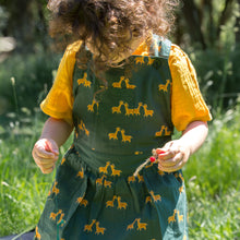 Lade das Bild in den Galerie-Viewer, Little-Green-Radicals-Green-And-Yellow-Pinafore-Dress-With-Giraffe-Print-Kid
