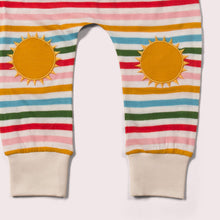 Load image into Gallery viewer,       Little-Green-Radicals-Rainbow-Striped-Patch-Joggers-With-Sunshine-Print-Closeup
