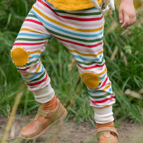     Little-Green-Radicals-Rainbow-Striped-Patch-Joggers-With-Sunshine-Print-Kid